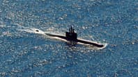 印度尼西亚海军说潜艇，船上有53名船员已经沉没了“loading=