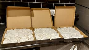 警方在比萨饼盒中查找500,000英镑的疑似药物