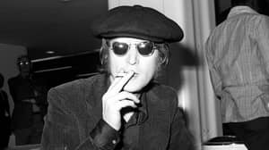 约翰列侬的妻子的杀手声称他告诉她关于谋杀情节