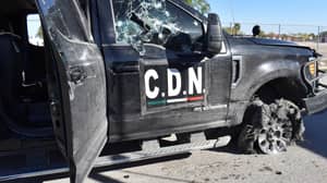 涉嫌墨西哥毒品卡特尔与警察的枪战中至少有21人死亡
