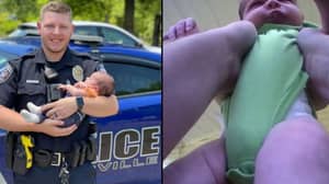 新秀警察英雄地拯救婴儿免于在人体摄像机中窒息