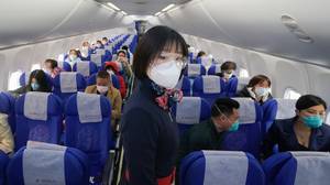 中国的机组人员被告知佩戴尿布以减少Covid-19风险