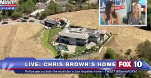 克里斯·布朗（Chris Brown）的房子目前被一支特警队包围