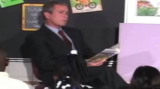 图片显示乔治·布什（George Bush）在学校教室里学到了9/11