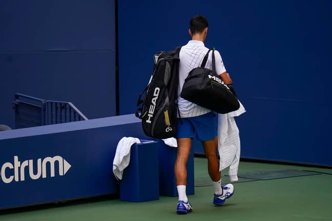 诺瓦克·德约科维奇（Novak Djokovic）在轰动一时默认比赛后离开了法庭。信用：PA图像“width=
