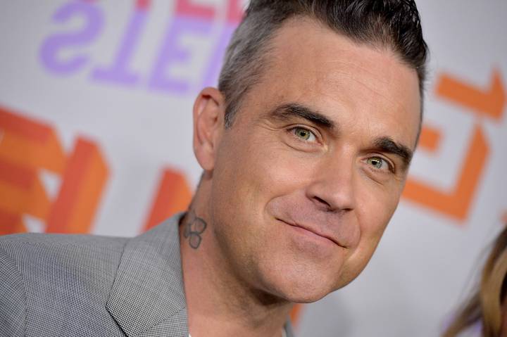 Robbie Williams揭示了心理健康恶魔让他带到了边缘